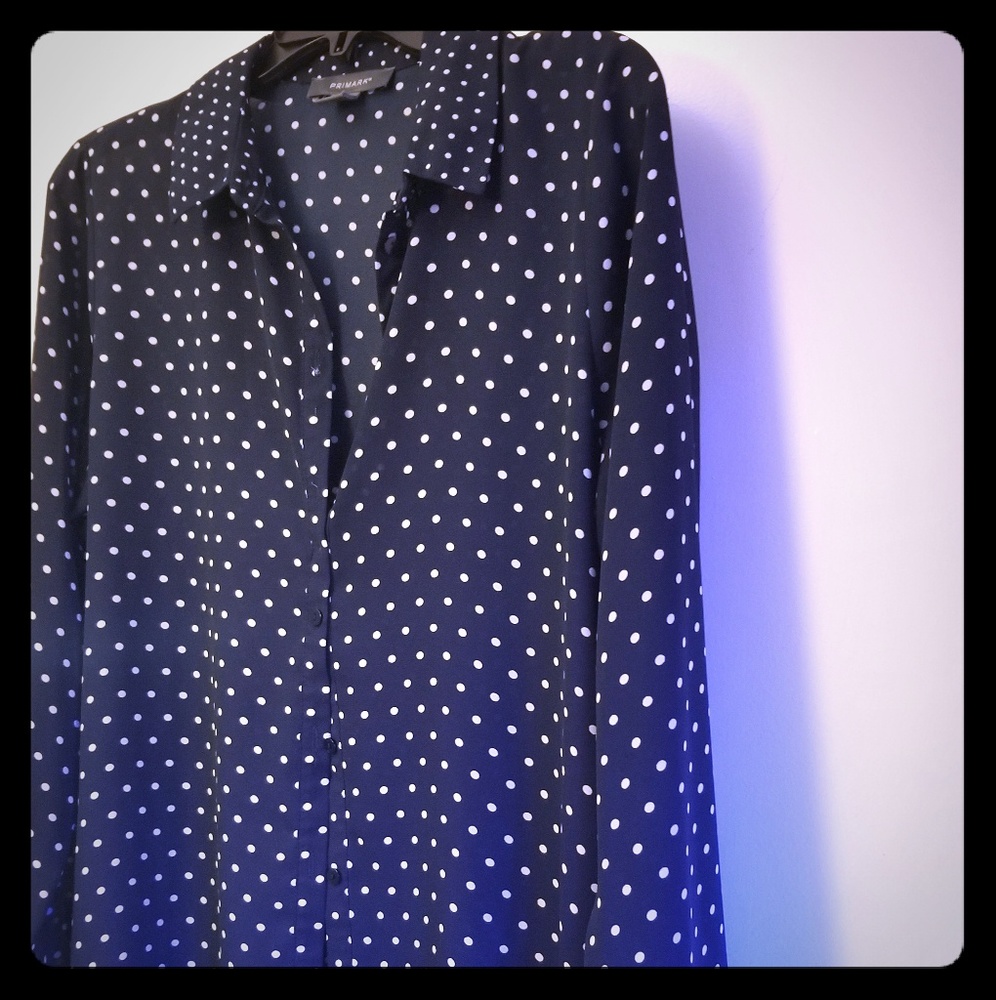 Polka dotted button up shirt